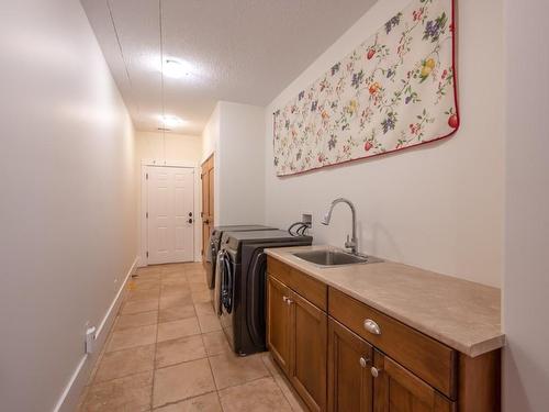 111-14419 Downton Avenue, Summerland, BC - Indoor Photo Showing Laundry Room
