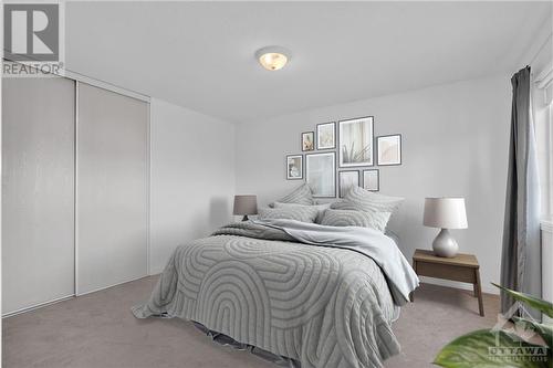 This photo has been virtually staged. - 1000 Serenity Avenue, Ottawa, ON - Indoor Photo Showing Bedroom