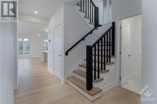Oak Stairs - 122 Orchestra Way, Ottawa, ON - Indoor Photo Showing Other Room