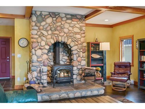 4815 Lakehill Rd, Windermere, BC - Indoor Photo Showing Living Room With Fireplace