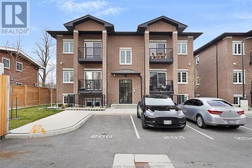 233 Watson Unit# 205, Windsor, ON - Outdoor With Balcony With Facade