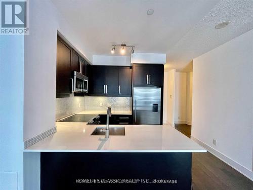 #1105Se -9199 Yonge St, Richmond Hill, ON - Indoor Photo Showing Kitchen With Double Sink