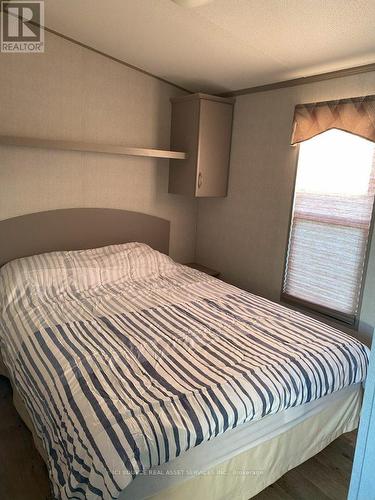 #217 -1051 Line 8 Rd, Niagara-On-The-Lake, ON - Indoor Photo Showing Bedroom
