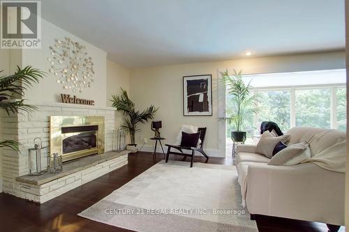 22 Brentwood Dr, Hamilton, ON - Indoor Photo Showing Living Room With Fireplace