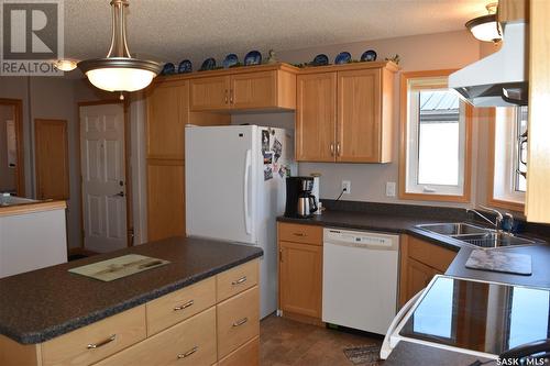 302 Richard Street, Manitou Beach, SK - Indoor Photo Showing Kitchen With Double Sink