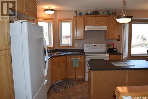 302 Richard Street, Manitou Beach, SK - Indoor Photo Showing Kitchen With Double Sink