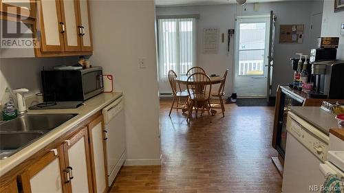 32 35E Avenue, Edmundston, NB - Indoor Photo Showing Kitchen With Double Sink