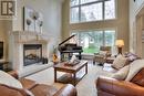 15 River Run Place, Woolwich, ON  - Indoor Photo Showing Living Room With Fireplace 