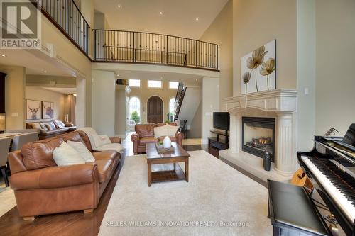 15 River Run Place, Woolwich, ON - Indoor Photo Showing Living Room With Fireplace
