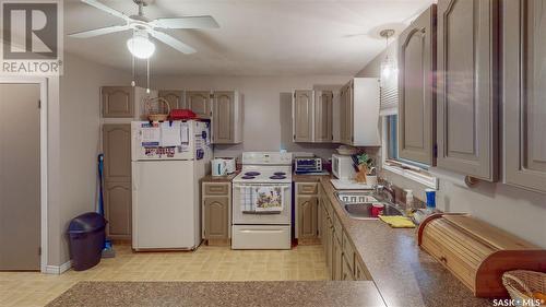 232 Grey Street, Sedley, SK - Indoor Photo Showing Kitchen With Double Sink