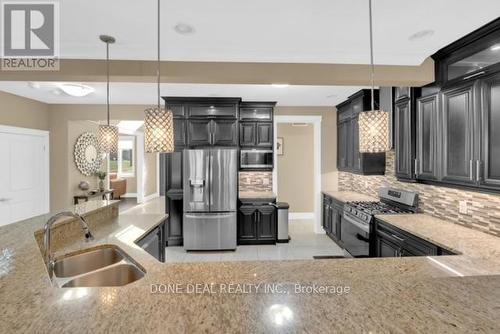 1115 Cora Greenwood Drive, Windsor, ON - Indoor Photo Showing Kitchen With Stainless Steel Kitchen With Double Sink With Upgraded Kitchen