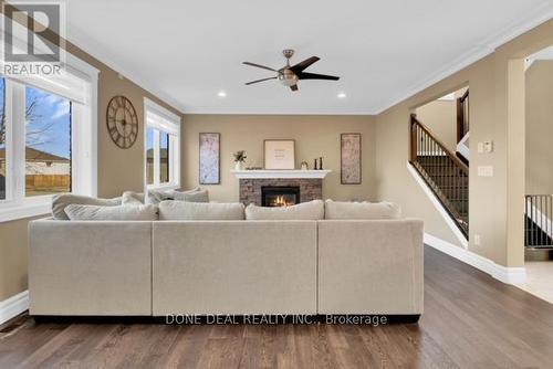 1115 Cora Greenwood Drive, Windsor, ON - Indoor Photo Showing Living Room With Fireplace