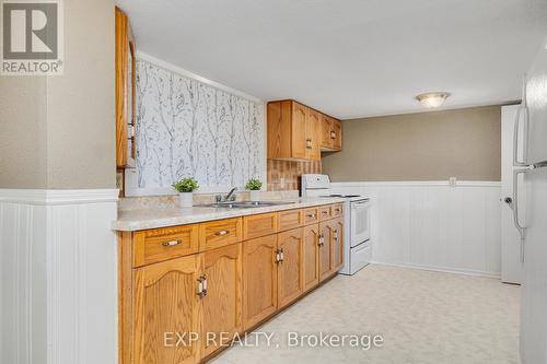 475 Victoria Ave S, North Perth, ON - Indoor Photo Showing Kitchen With Double Sink