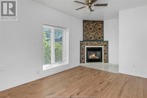 1523-27 Shepherd Street East, Windsor, ON - Indoor Photo Showing Living Room With Fireplace
