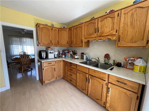 328 1 Avenue, Mccreary, MB - Indoor Photo Showing Kitchen With Double Sink