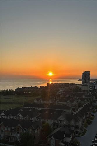 Another gorgeous sunrise from your 13th floor balcony! - 550 North Service Road|Unit #1307, Grimsby, ON - Outdoor With Body Of Water With View
