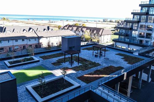 Rooftop garden with communal barbecues. - 550 North Service Road|Unit #1307, Grimsby, ON - Outdoor