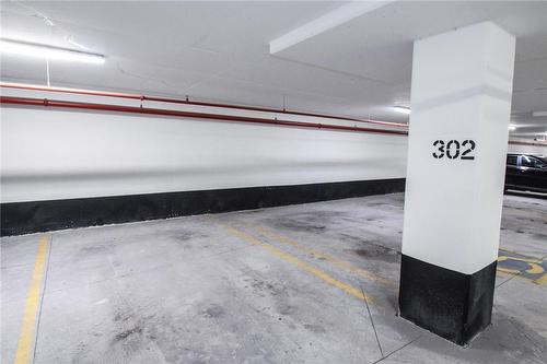Spacious, underground parking, your spot is very close to the elevator. - 550 North Service Road|Unit #1307, Grimsby, ON - Indoor Photo Showing Other Room