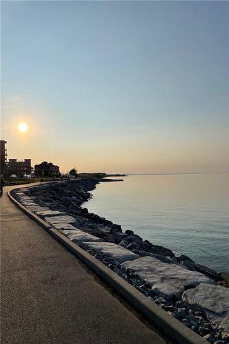 You are a short stroll from the waterfront trail. - 550 North Service Road|Unit #1307, Grimsby, ON - Outdoor With Body Of Water With View