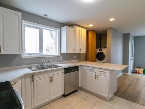 3 Matheson Street N, Kenora, ON - Indoor Photo Showing Kitchen With Double Sink