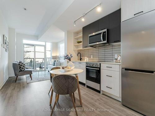 215-2300 St Clair Ave W, Toronto, ON - Indoor Photo Showing Kitchen With Upgraded Kitchen