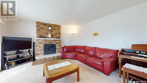 6304 8Th Avenue, Regina, SK - Indoor Photo Showing Living Room With Fireplace