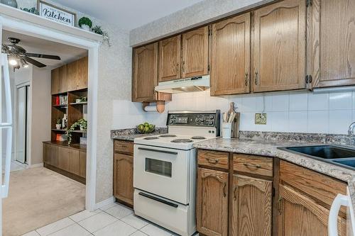 3050 Pinemeadow Drive|Unit #57, Burlington, ON - Indoor Photo Showing Kitchen With Double Sink