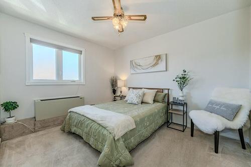A second bedroom with ample room - 3050 Pinemeadow Drive|Unit #57, Burlington, ON - Indoor Photo Showing Bedroom