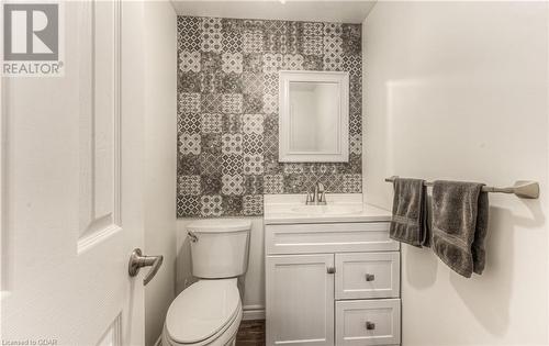 Tastefully Decorated 2 Piece Main Floor Bath - 83 Danville Avenue, Acton, ON - Indoor Photo Showing Bathroom