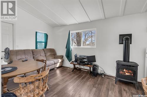 13 Rose Crescent, Pike Lake, SK - Indoor Photo Showing Living Room With Fireplace