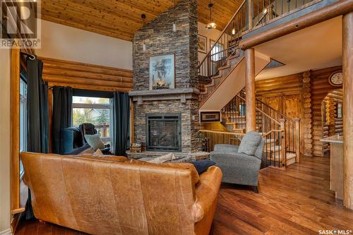 16 Lakeview Drive, Lac Des Iles, SK - Indoor Photo Showing Living Room With Fireplace