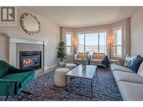 1059 Mt Fosthall Drive, Vernon, BC - Indoor Photo Showing Living Room With Fireplace