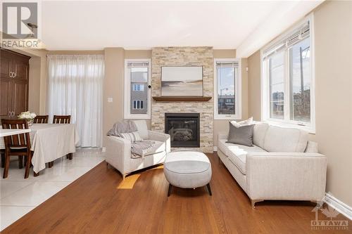 375 Mountain Sorrel Way, Ottawa, ON - Indoor Photo Showing Living Room With Fireplace