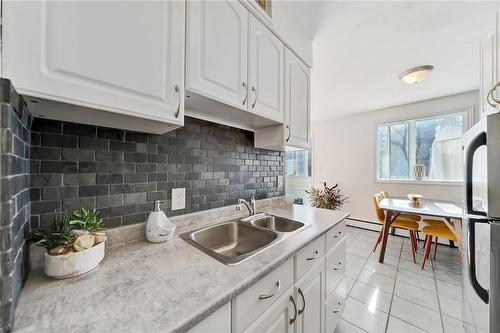 101 Queen Street S|Unit #501, Hamilton, ON - Indoor Photo Showing Kitchen With Double Sink