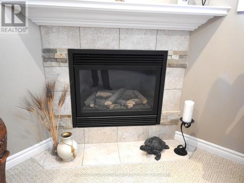 395 Bourdeau Road, London, ON - Indoor Photo Showing Living Room With Fireplace