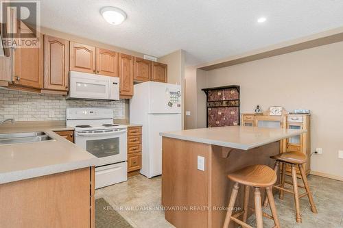 7 Jolene Crt, Perth East, ON - Indoor Photo Showing Kitchen With Double Sink