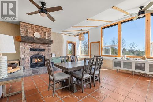 1375 Queensborough Road, Madoc, ON - Indoor Photo Showing Dining Room With Fireplace