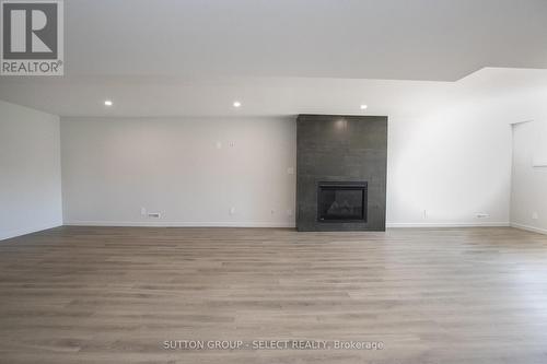 99 Optimist Dr, Southwold, ON - Indoor With Fireplace