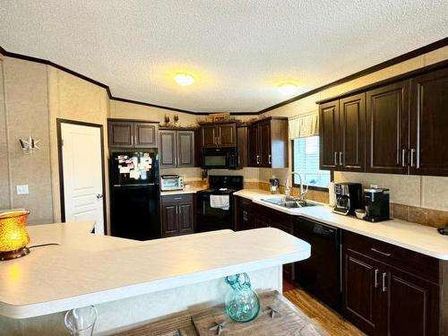2581 Spring Bank Ave, Merritt, BC - Indoor Photo Showing Kitchen With Double Sink