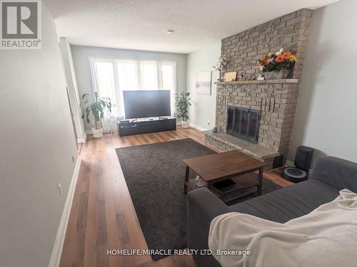 442 Rimosa Crt, Oshawa, ON - Indoor Photo Showing Living Room With Fireplace