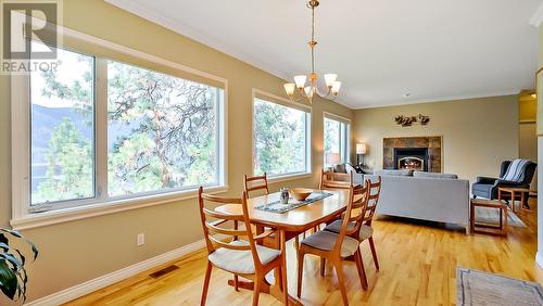 2188 Bennett Road, Kelowna, BC - Indoor Photo Showing Dining Room With Fireplace