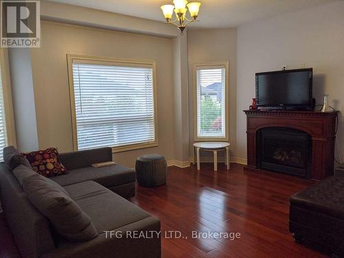 47 Aylesworth Ave, Clarington, ON - Indoor Photo Showing Living Room With Fireplace
