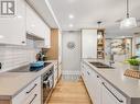 301 - 1765 Queen Street E, Toronto, ON  - Indoor Photo Showing Kitchen With Double Sink 