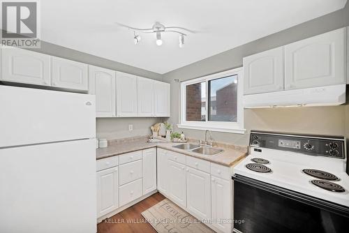 #45 -401 Wentworth St W, Oshawa, ON - Indoor Photo Showing Kitchen With Double Sink