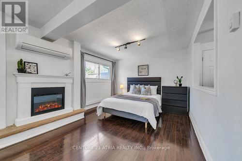 143 Silas Hill Dr, Toronto, ON - Indoor Photo Showing Bedroom With Fireplace