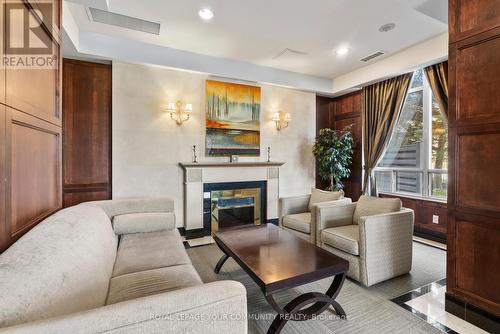 #905 -35 Finch Ave E, Toronto, ON - Indoor Photo Showing Living Room With Fireplace