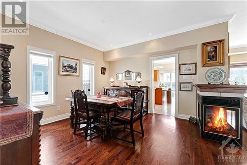 4 Staten Way, Ottawa, ON - Indoor Photo Showing Dining Room With Fireplace