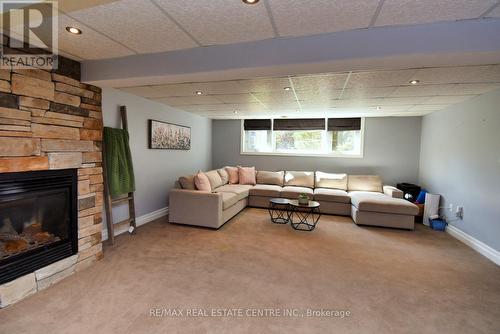 23 Brelus Dr, Haldimand, ON - Indoor Photo Showing Living Room With Fireplace