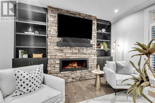 2727 Torrey Pines Way, London, ON - Indoor Photo Showing Living Room With Fireplace