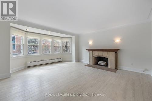 16 Farnham Avenue, Toronto, ON - Indoor Photo Showing Living Room With Fireplace